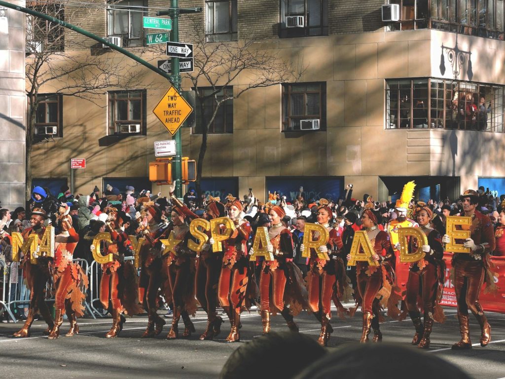 a group of people that are standing in the street