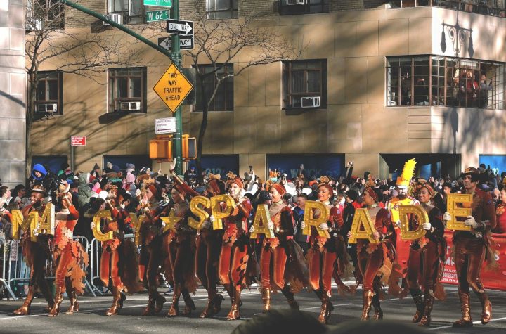 a group of people that are standing in the street